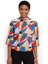 A Touch of Sophistication – Mock Neck Top with Delicate Ruffle Accents